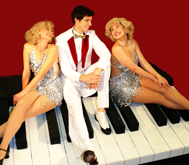 two_girls__a_guy_on_a_piano-3749695